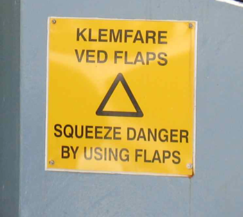 squeeze danger sign